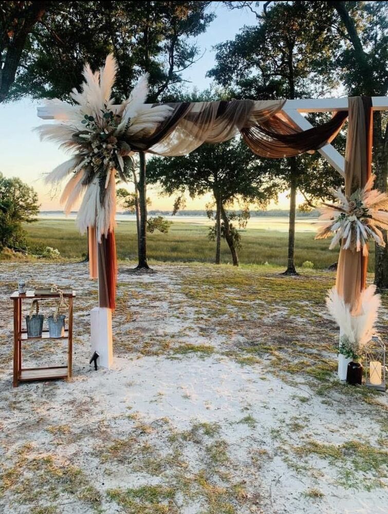 Cox Landing — Ceremony Arch at Sunset